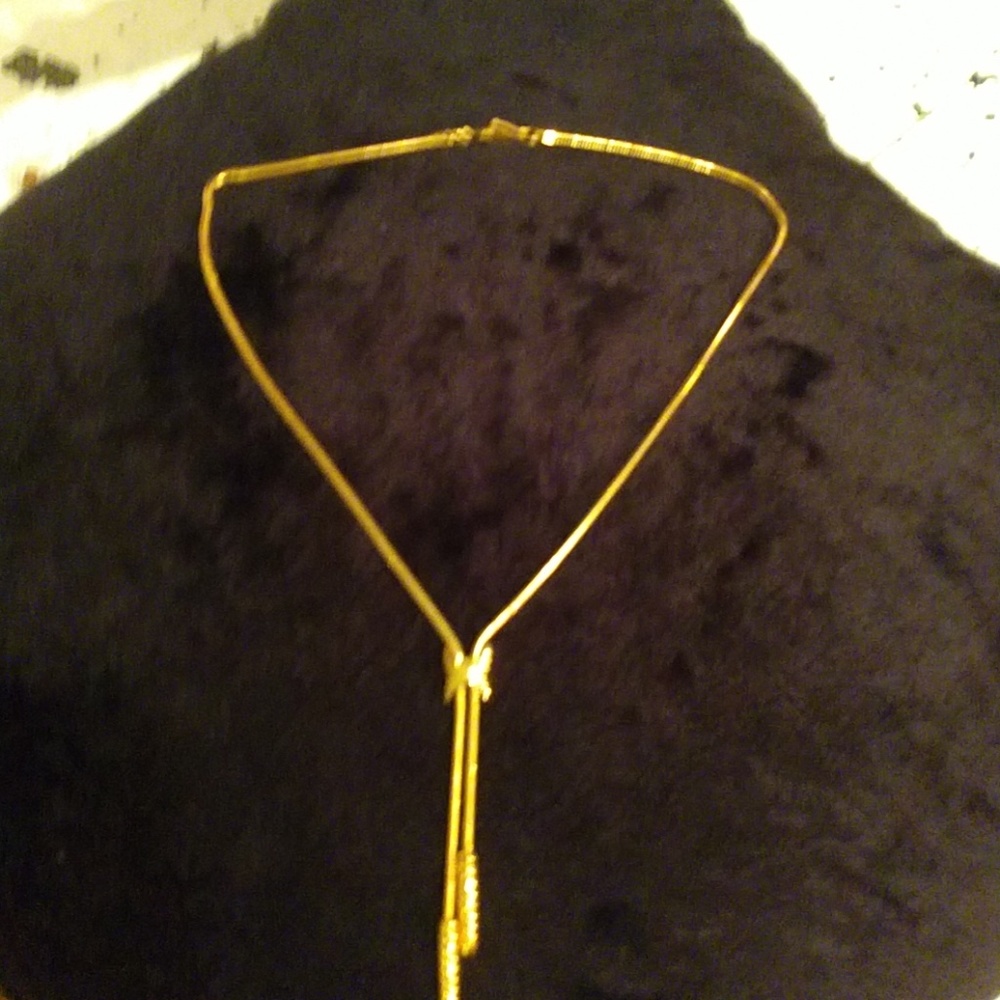 Gold tone choker necklace